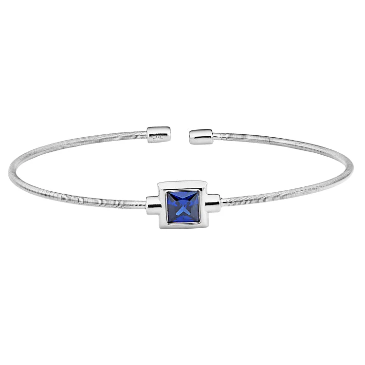 Custom Engraved Bracelets-Rhodium Finish Sterling Silver Cable Cuff Bracelet with Princess Cut Simulated Blue Topaz Birth Gem