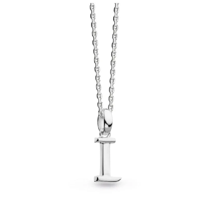 Heart-Shaped Birthstone Ring-Large Cross Necklace-Silver Signature Capital I Necklace