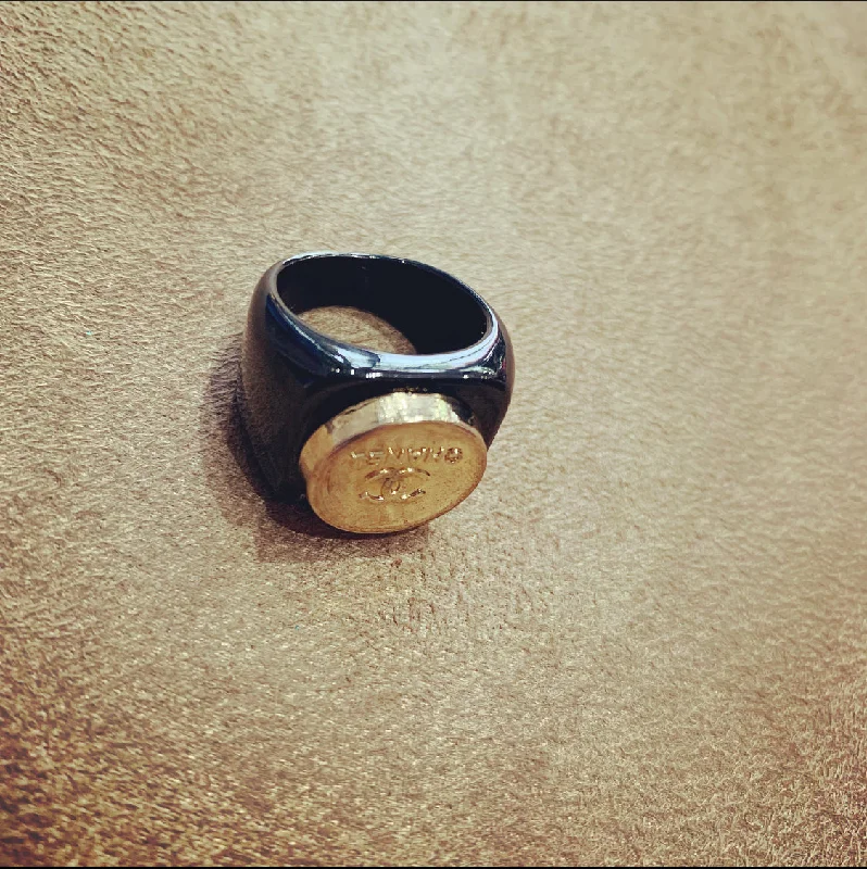 Classic Wedding Band Set for CouplesVintage Chanel gold button ring in black setting